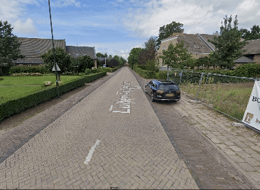 Stalen inrijpoort en looppoort