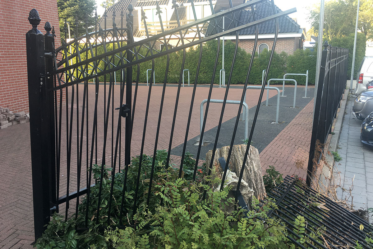 stormschade aan hekwerk